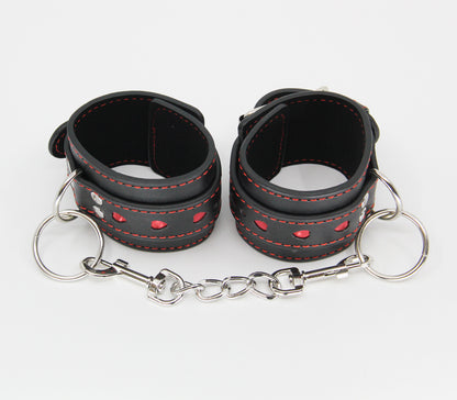 BERLIN BABY HAND CUFFS HEART BLACK RED