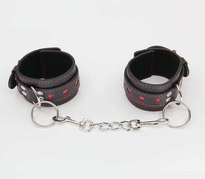 BERLIN BABY HAND CUFFS HEART BLACK RED