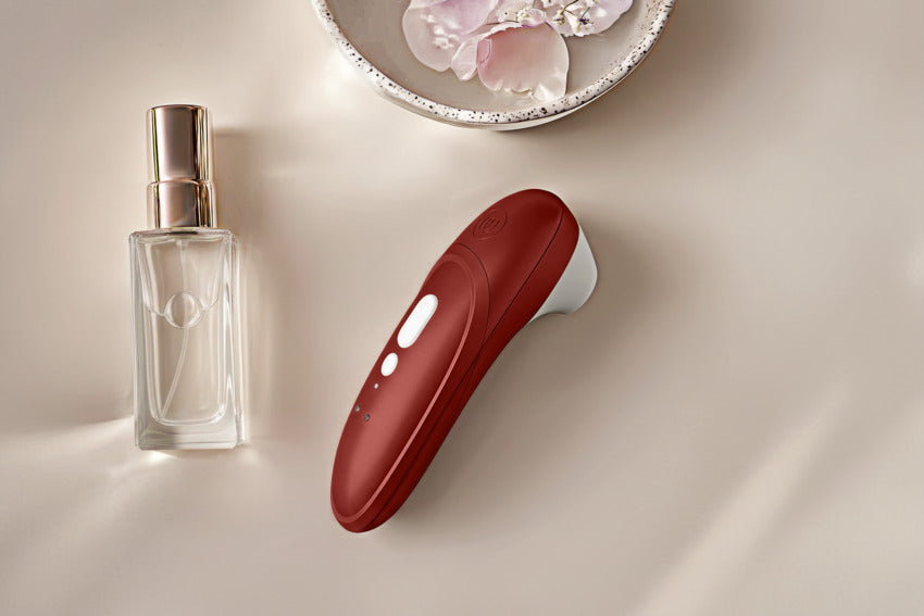 WOMANIZER PRO [CL:RED]